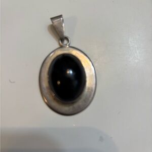 Sleek Black and Silver Oval Pendant Necklace